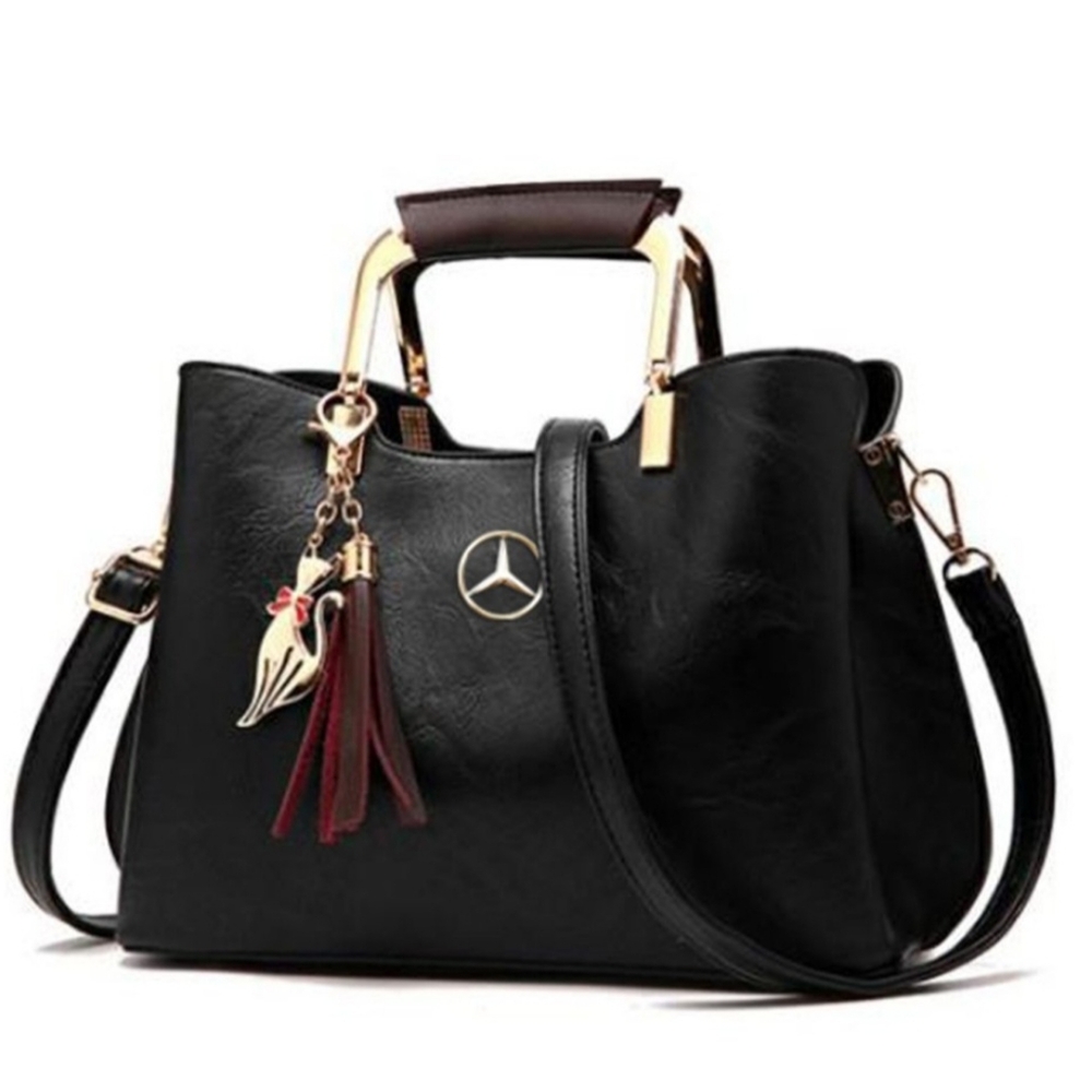 Elegant Black Handbag with Gold Accents
